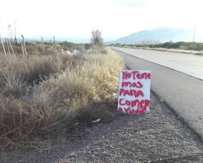 Doloroso cartel sobre la Ruta 7 en Luján: “No tenemos para comer, ayuda”